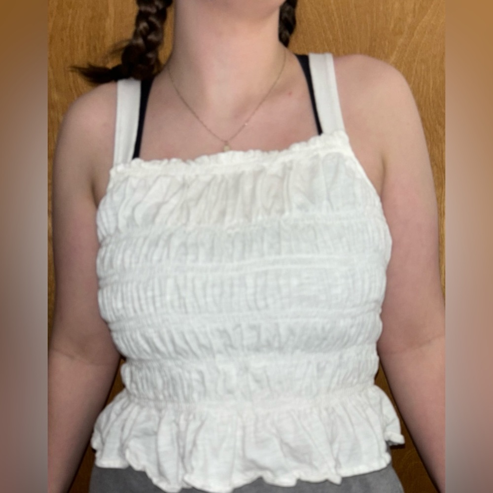 Universal Thread White ruffled tank top. The size is XL.